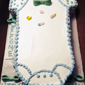 onesie baby shower cake