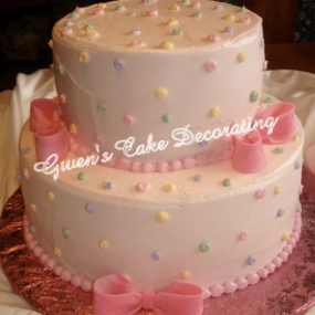 pink dots and bow baby shower cake