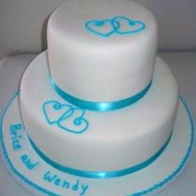 Pool blue ribbon bridal shower cake