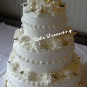 50th anniversary cake with gold leaves