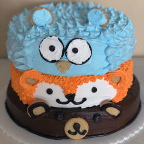 baby shower cake with animal layers